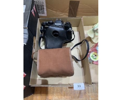 A Ricoh XR-I 35mm camera and a Kodak Brownie box camera