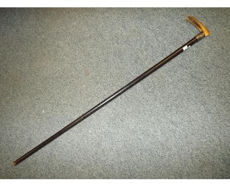 A gentleman's horn handled walking stick with ebony shaft and silver hallmarked collar, Birmingham assay, 92cm (l) and one ot
