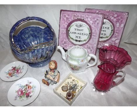 A mixed lot of ceramics to include Goebel Hummel figurine, Cranberry glass, 19th century wall plaques, and a Sylvan Ware hand