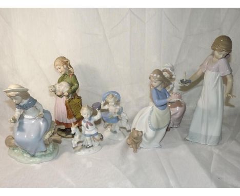 Seven ceramic figures to include four Nao by Lladro and three others - included in the lot is two empty boxes by Nao and Nada