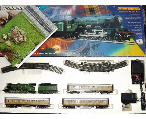 Model railways - a Hornby OO gauge boxed train set, Flying Scotsman comprising locomotive and tender, three carriages, track,