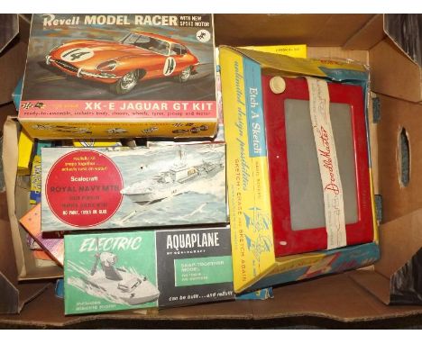 A collection of vintage toys and models to include an Etch a Sketch with original box, Revell XK-E Jaguar model kit, Scalecra