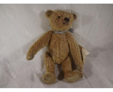 Steiff bear - 125th anniversary Appolonia Margarete teddy bear issued in a limited edition, blonde, button in ear with white 