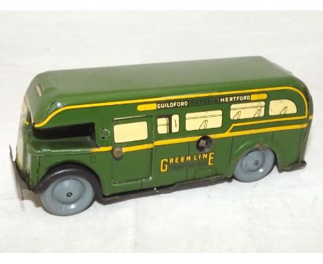A Wells Brimtoy Pocketoy tin-plate clockwork half-cab Greenline single decker bus, green with grey plastic balloon wheels, de