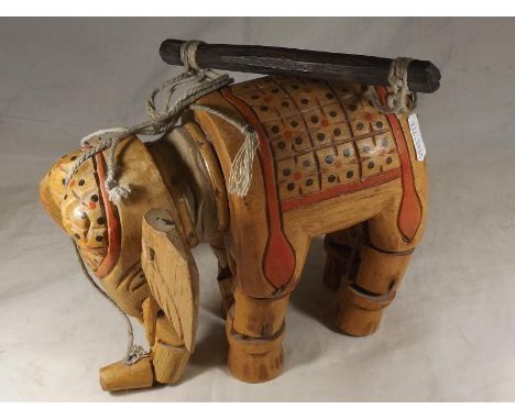 A wooden reticulated puppet depicting an elephant, 17 cm (h)
