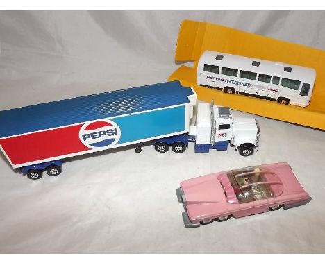 A Dinky die-cast model Lady Penelope's FAB1, Thunderbirds No 100 with Lady Penelope and Parker figures, a Corgi National Expr