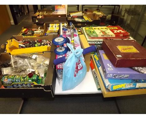 A very large mixed lot of toys to include a box containing playworn cars, a box of tin plate model railways, track, quantity 