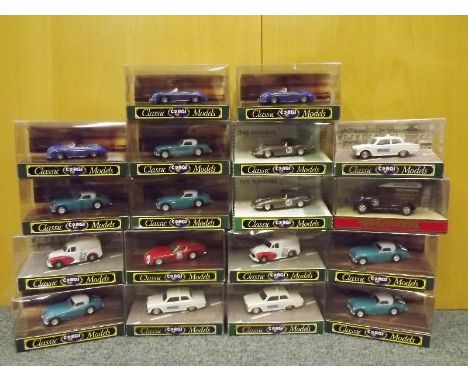 18 die-cast model motor vehicles comprising 16 Corgi Classic Models and two Matchbox Models of Yesteryear, mint in boxes