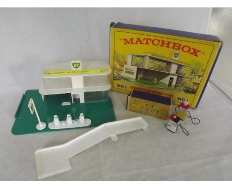 A Matchbox Service Station MG-1 by Lesney, very good boxed example and a accessory pack # A-1 BP garage petrol pumps and sign