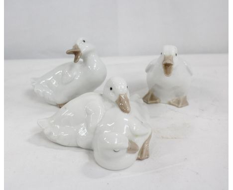 Three Nao porcelain figures of ducklings 