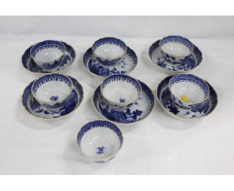 Seven late 18th century blue and white tea bowls and six matching saucers, "Nankin Willow" pattern, lobed gilt rims 