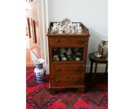 Edwardian mahogany display cabinet, gallery edge above glazed top, three drawers with inlaid spandrels and glazed front cabin