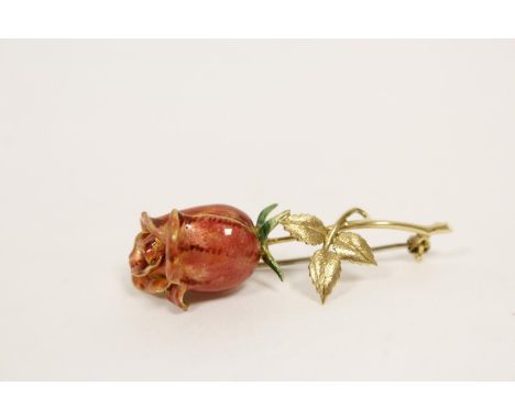 Gold and enamel rosebud brooch, the pin marked "750"Condition report:Slight chip to enamel on petal. Length 47mm. 