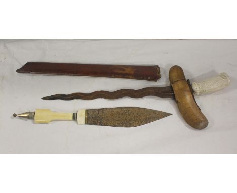 Antique Indonesian Kris sword with hatched ivory handle in wooden hardwood scabbard and another dagger. (2) 