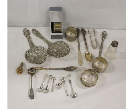 Silver napkin ring boxed, pair of white metal Dutch style pierced spoons and three epns napkin rings. (20)