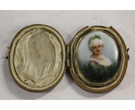 Miniature portrait on porcelain in case 