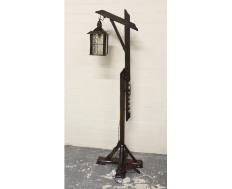 Reproduction dark oak lantern standard lamp (electrical rewiring required). 