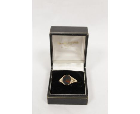 9ct gold signet ring with oval bloodstone. 6gCondition report:Bloodstone, light scratches around edge. Ring has been re-sized