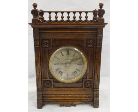 Victorian oak mantle clock with silvered dial by J Penlington, Liverpool. 39cm 