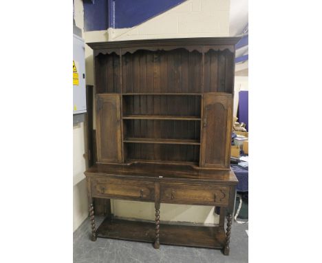 1920's oak "Welsh" dresser, plate rack and cupboards above two drawers on spiral twist supports, flat shelf undertier, 150cm 