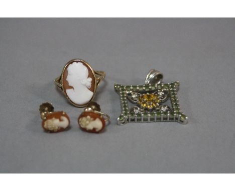 A 9CT CAMEO RING, ring size R, a pair of earrings and a pendant, approximate weight 12.1 grams