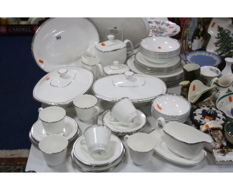 ROYAL DOULTON 'PLATINUM CONCORD' DINNERWARES, comprising two tureens and covers, sauce boat on stand, meat plate, tea pot, mi