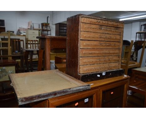 A STAINED PINE ENGINEERS TOOL CHEST, revealing seven various drawers with contents
