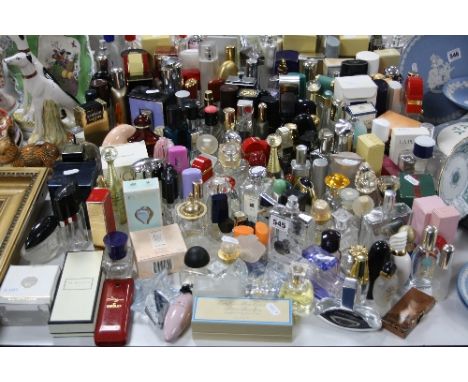 A COLLECTION OF MODERN PERFUME BOTTLES, some items boxed, including Clinique, Jo malone, Boucheron, Chopard, etc