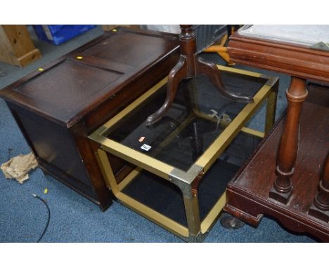 A BRASS EFFECT AND SMOKED GLASS TWO TIER COFFEE TABLE, an oak linenfold blanket box and a Georgian tripod table (3)