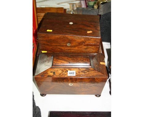 A ROSEWOOD TEA CADDY, of sarcophagus shaped, fitted interior (no mixing bowl) on four bun feet, width approximate 30.5cm (no 