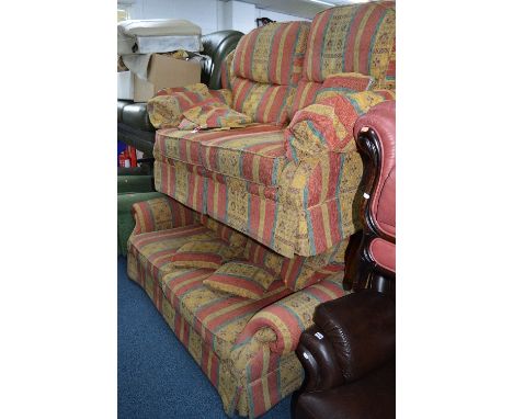 AN UPHOLSTERED TWO PIECE LOUNGE SUITE, comprising of a three seater sofa and a two seater sofa with striped upholstery