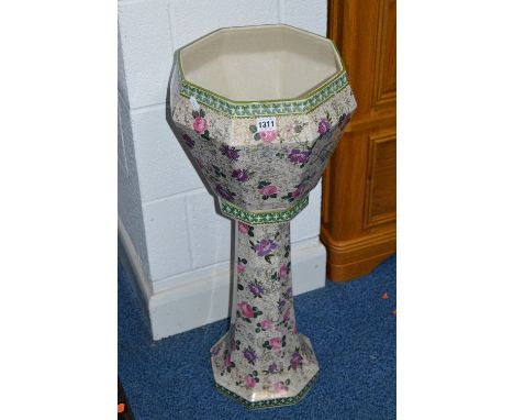 A FLORALLY DECORATED CERAMIC PLANTER AND STAND, Phoenix Ware, Roslyn, stamped to underside, approximate height 79cm