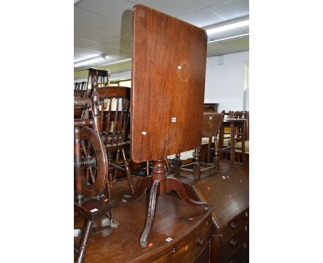 A GEORGIAN MAHOGANY RECTANGULAR TILT TOP TRIPOD TABLE