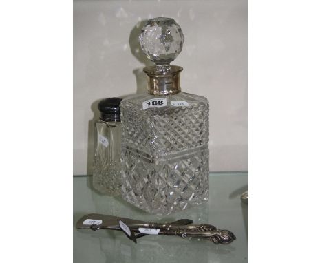 AN ELIZABETH II CUT GLASS BOHEMIA CRYSTAL DECANTER AND STOPPER WITH SILVER COLLAR, Birmingham 1998, together with a silver to