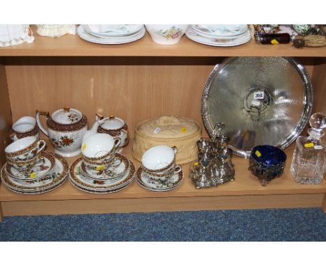 A SILVER PLATED THREE FOOTED TRAY, an EPNS egg cruet stand, cut glass decanter, game pie dish, Oriental teaset etc