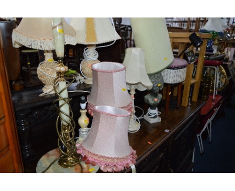 A GEORGIAN CIRCULAR TRIPOD TABLE, a light oak occasional table, a quantity of table lamps, two log buckets, two mirrors, etc 