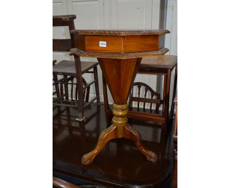 A MAHOGANY SEWING BOX, on a tripod support