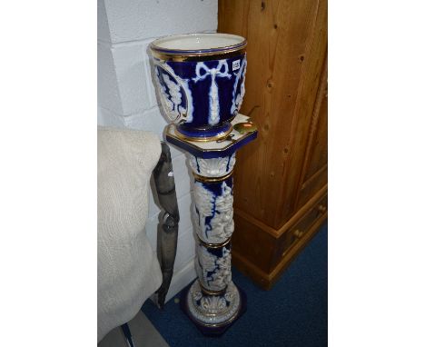 A BLUE AND WHITE CERAMIC JARDINIERE AND PLANTER, approximate height 131cm