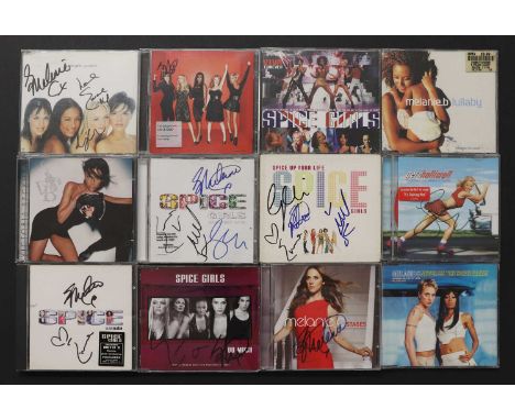 A collection of signed Spice Girls memorabiliacomprising 40 Signed Items, to include SPICE GIRLS, The Movie: A Double Video (