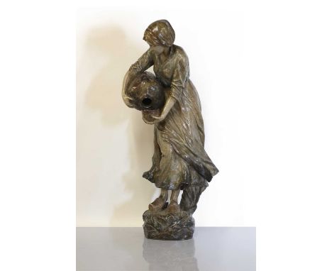 A Goldscheider Art Nouveau terracotta figure,c.1910, by Cherc, modelled as a Breton woman pouring water, impressed marks,65cm