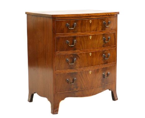 A Regency mahogany bow front chest of drawers, the arrangement of four drawers with ivory escutcheons, 64cm wide 46cm deep 76