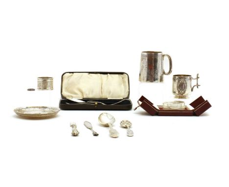 A collection of silver items,comprising a Christening mug, Birmingham 1900, with a vacant cartouche, 7.9cm high, a French sil