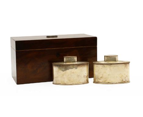 A George III flame mahogany tea caddy,of rectangular form, fitted pair of silver plated oval tea canisters30.5cm wide14.5cm d