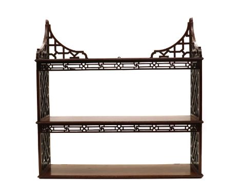 A mahogany wall shelf,late 19th century, in the manner Chippendale, with fret cut decoration,64cm wide18cm deep65cm highCondi