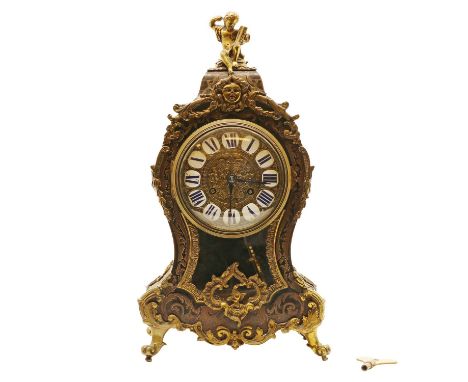 A tortoiseshell and brass mantel clock, late 19th century, French, in the manner of Andre Charles Boulle,34cm highCondition R
