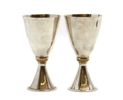 A pair of limited edition silver wedding cups,by Mappin &amp; Webb Ltd, London 1972, numbered 42 and 994 out of 1000, each wi