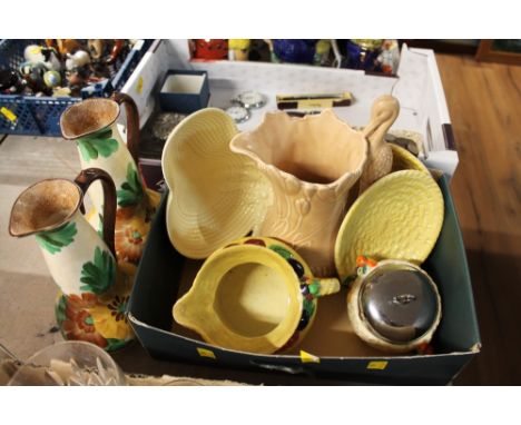 Pair of Hancocks Ivory jugs, Carltonware jugs and dishes, Sylvac stork jug and Clarice Cliff Celtic Harvest pot  