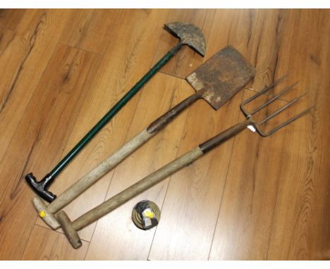 Set of weighing scale weights, spade, fork and hoe