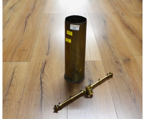 Brass shell case and poker 