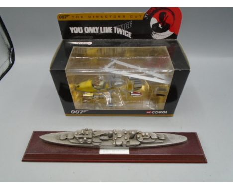 Corgi 007 helicopter model, boxed and an HMS Belfast model ship on plinth